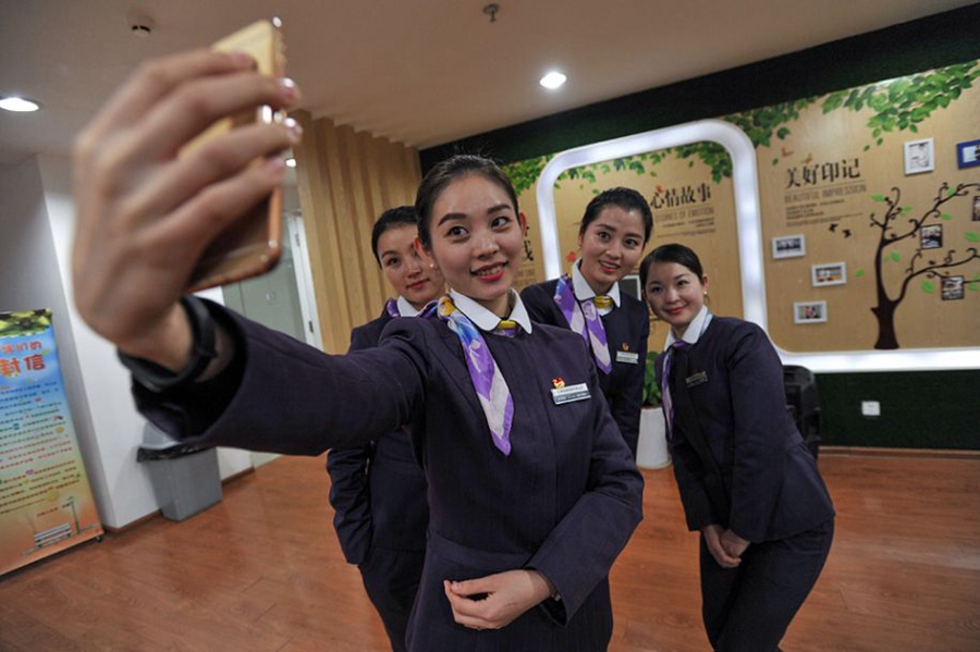 Bullet train stewardesses during Spring Festival travel rush