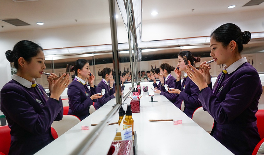 Bullet train stewardesses during Spring Festival travel rush