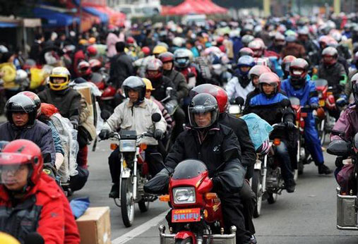 First freight train takes motorcycles home for Spring Festival 