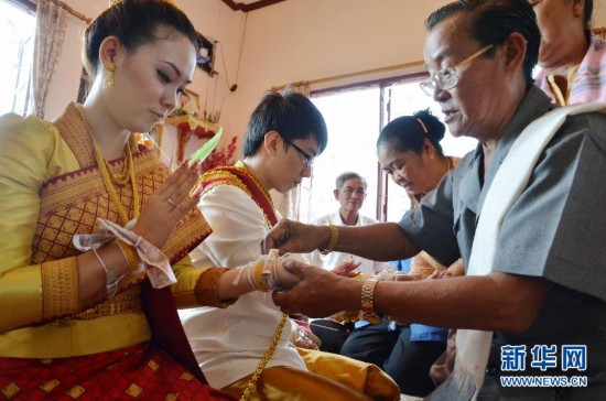 Weddings in Laos a merry mix of culture, tradition, geniality and whiskey