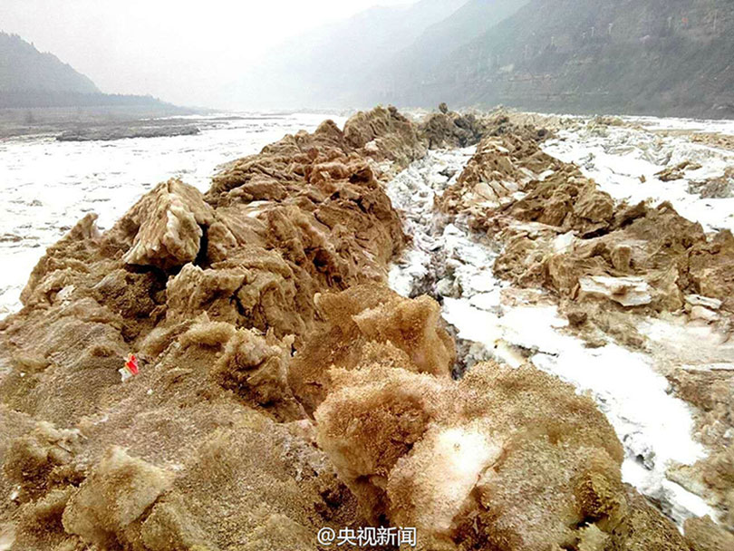 Breathtaking frozen Hukou Waterfall
