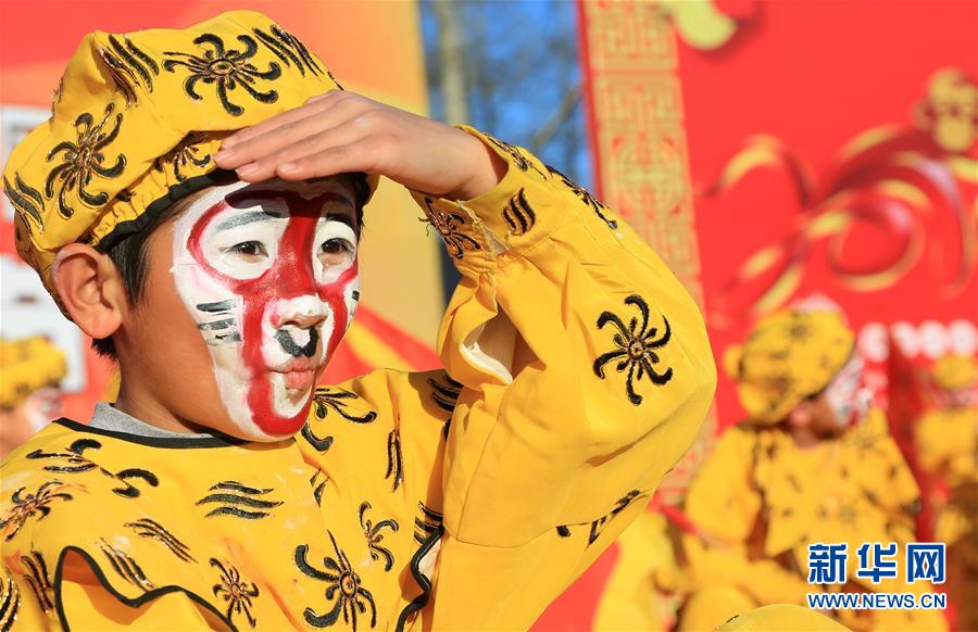 Children dress up to greet the Year of the Monkey