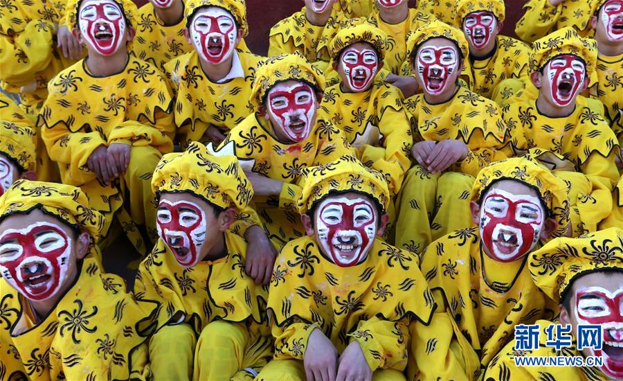 Children dress up to greet the Year of the Monkey