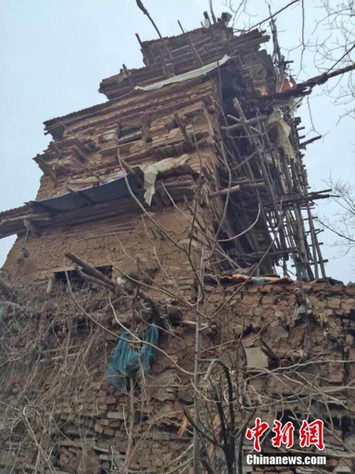 Man spends 10 years building a 7-story house out of clay, stone and wood