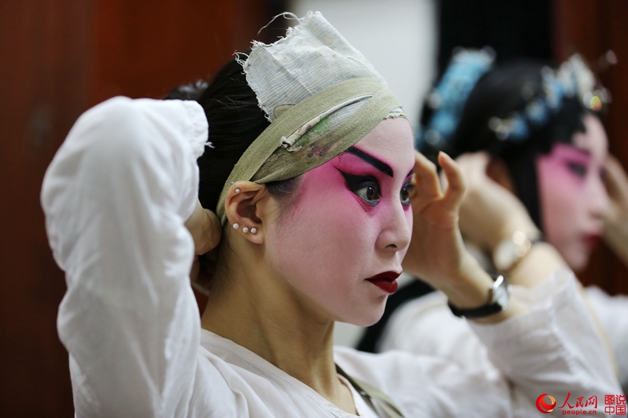 The backstage of a traditional Chinese opera troupe