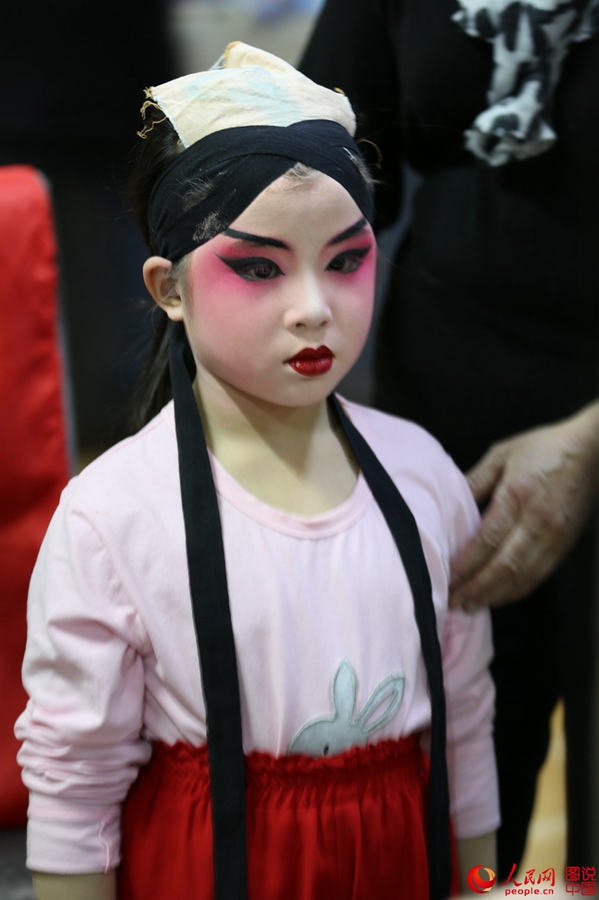 The backstage of a traditional Chinese opera troupe