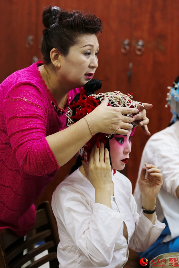 The backstage of a traditional Chinese opera troupe