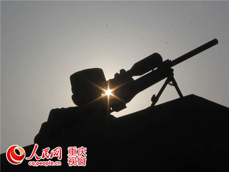 Chongqing sniper’s new record: 13 holes on a rice grain