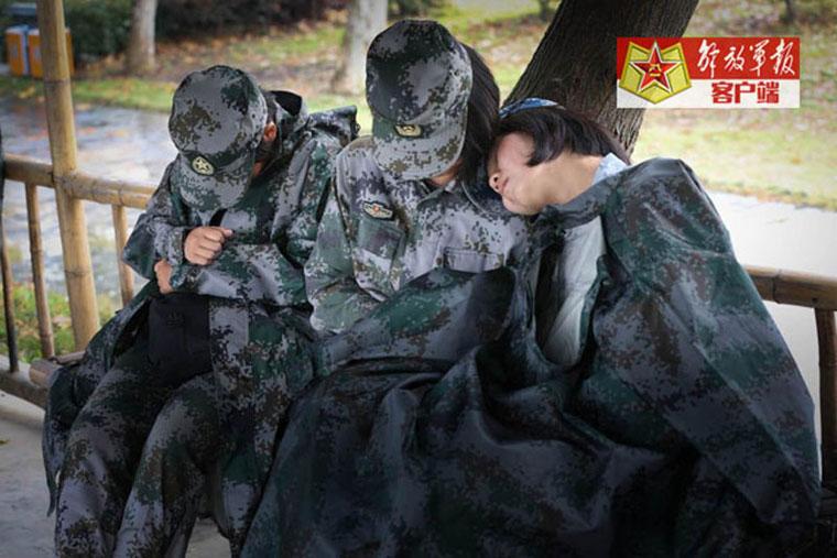 Versatile female soldiers in military camp
