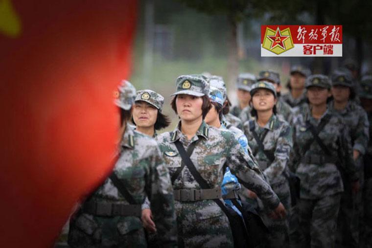 Versatile female soldiers in military camp
