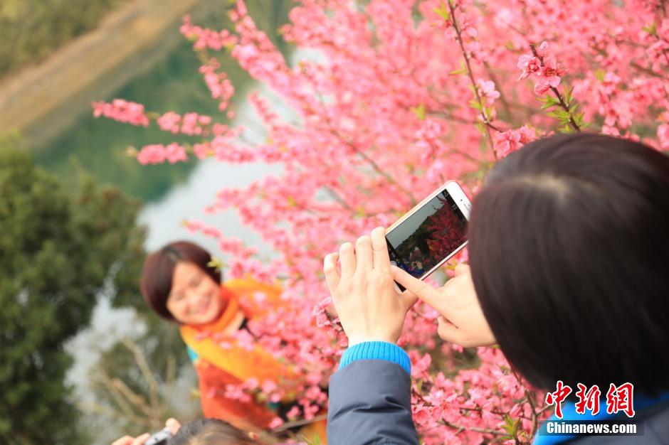 Young women wear traditional Hanfu to mark the Flower Festival in China