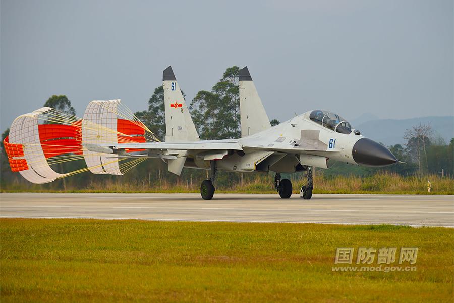 Chinese J-11 fighters conduct training in South China Sea