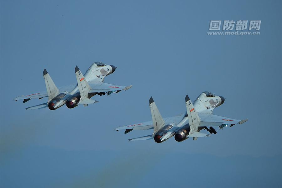 Chinese J-11 fighters conduct training in South China Sea