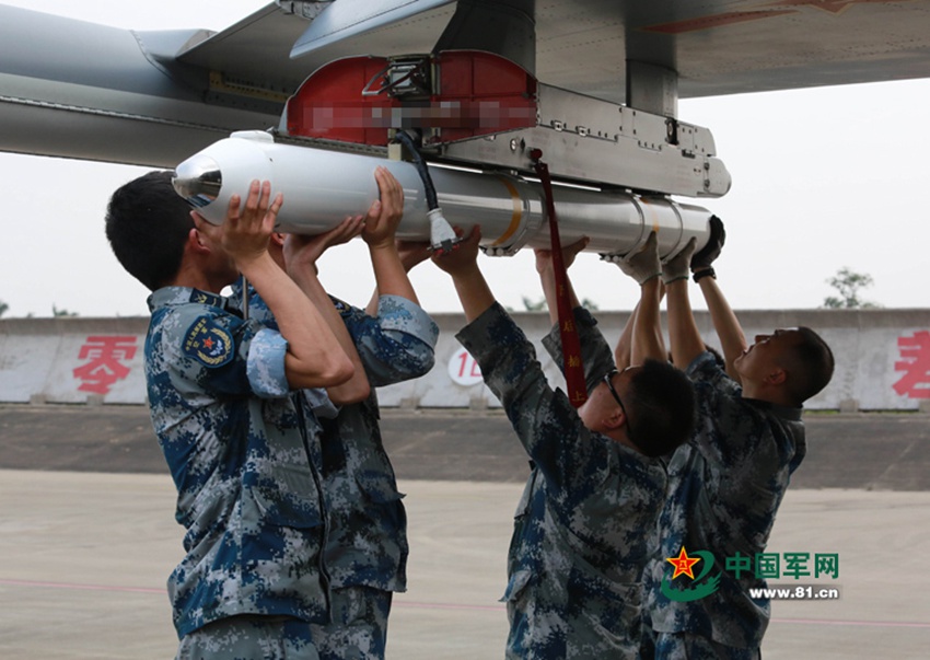 J-11 fighter jets conduct air-to-air combat training