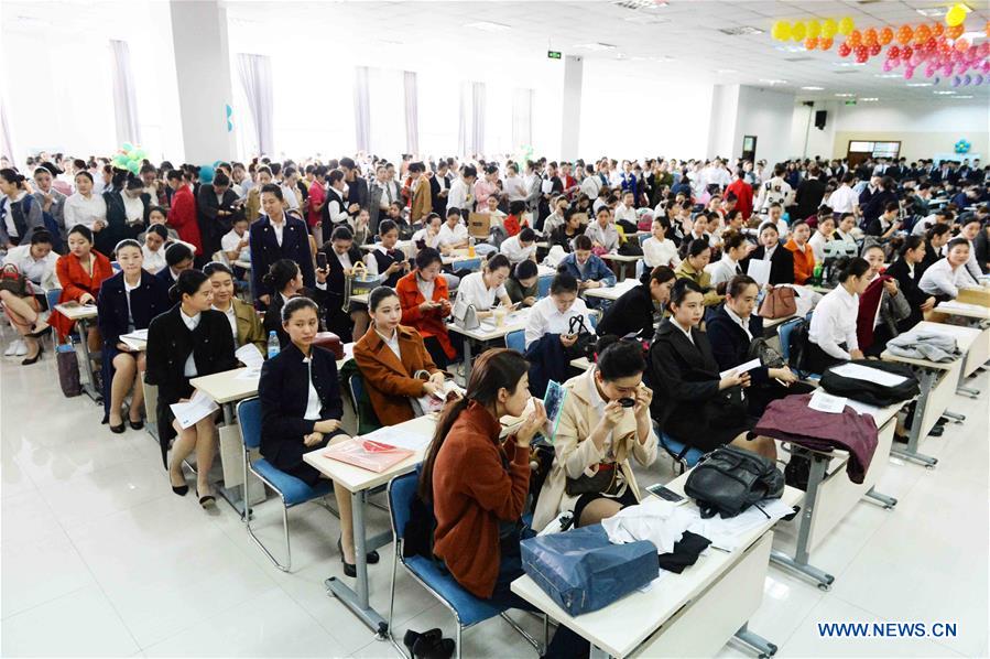 Applicants attend airline stewardess audition in Harbin, NE China