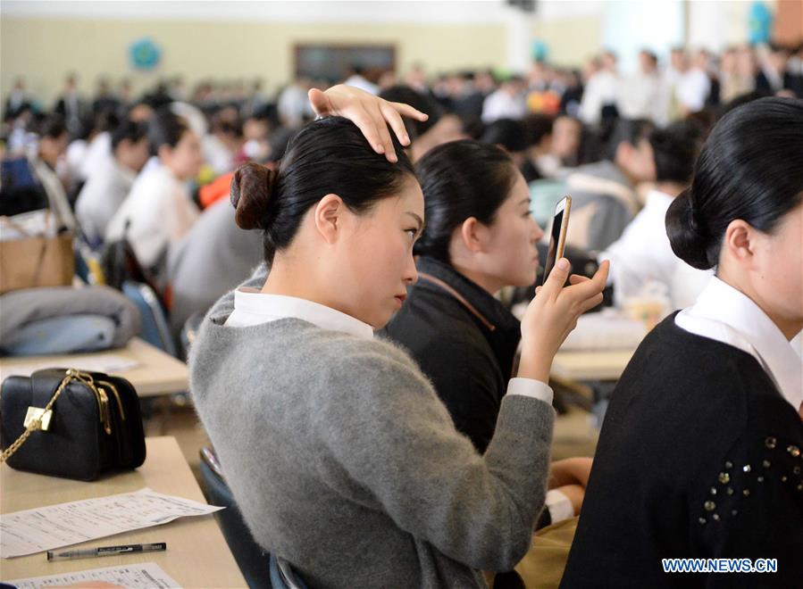 Applicants attend airline stewardess audition in Harbin, NE China