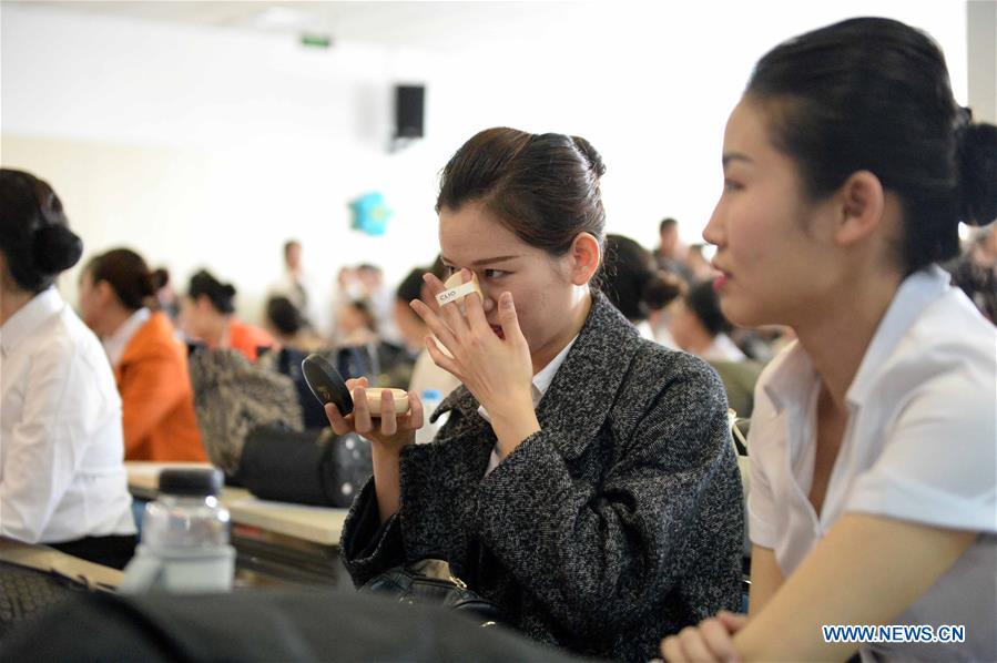 Applicants attend airline stewardess audition in Harbin, NE China