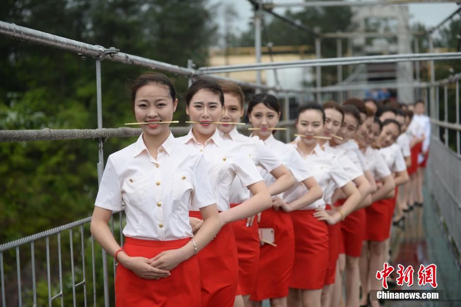 Etiquette training on all-glass suspension bridge