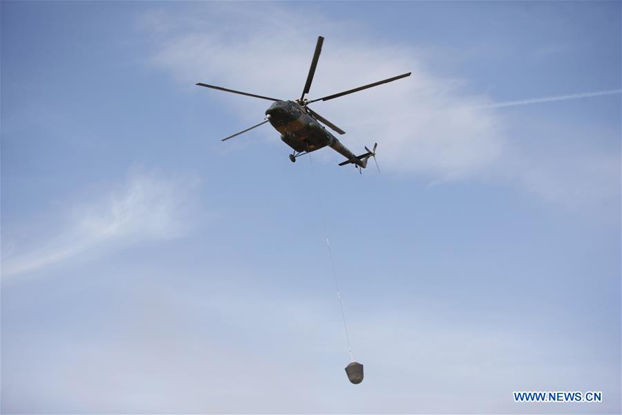 Re-entry capsule of SJ-10 lands in N. China