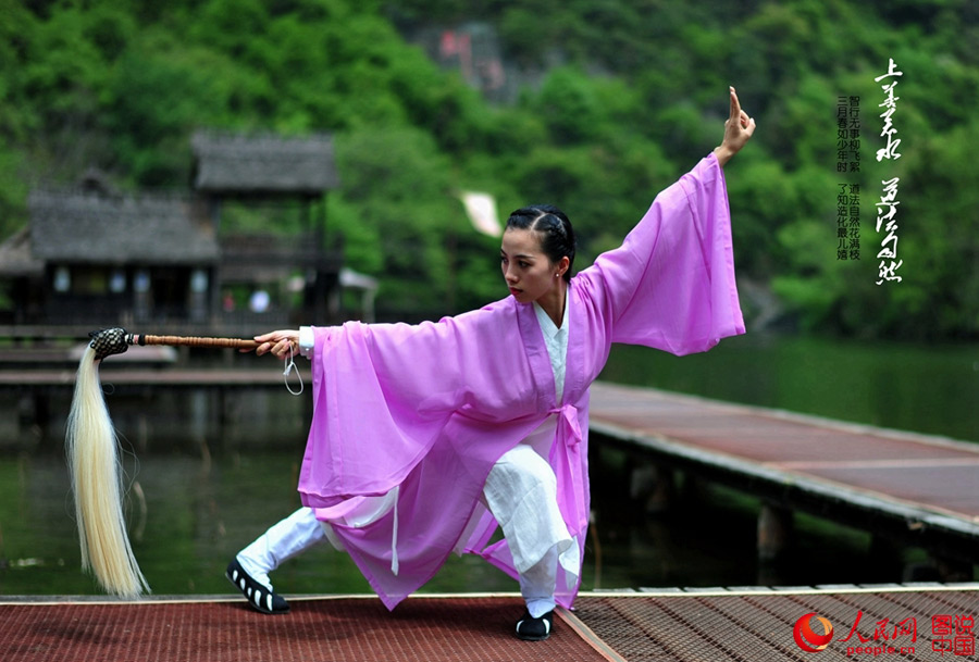 Enthusiasts perform Kung Fu at Wudang Mountain