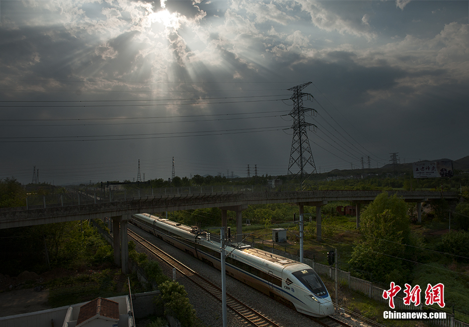 What a beautiful view! Bullet train running through fields