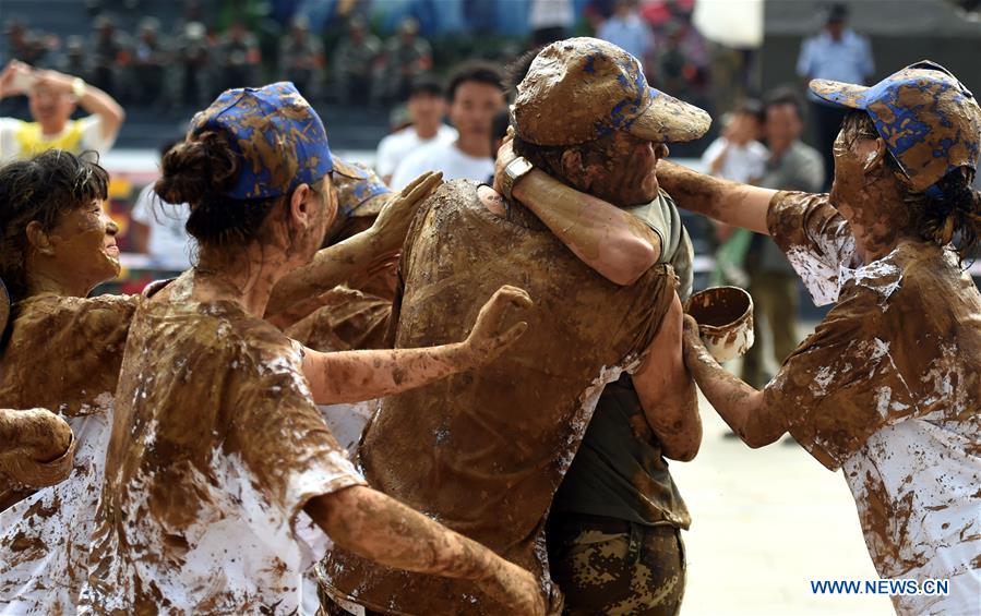 Muddy carnival held in Southwest China's Yunnan