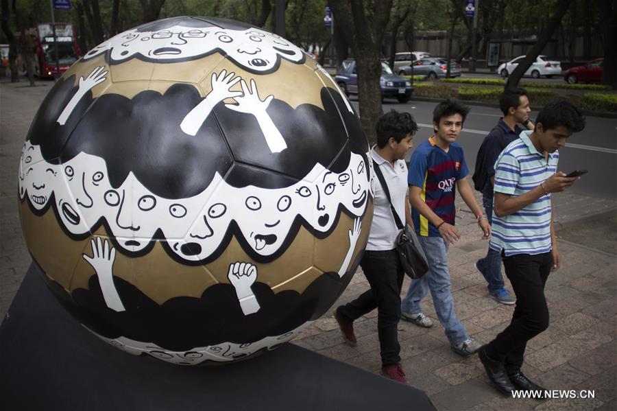 64 sculptures in shape of soccer ball exhibited in Mexico