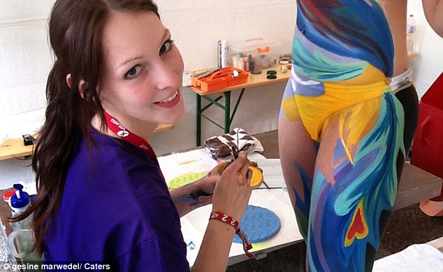 Naked models transformed into landscapes, birds and even DRAGONS by body painting artist