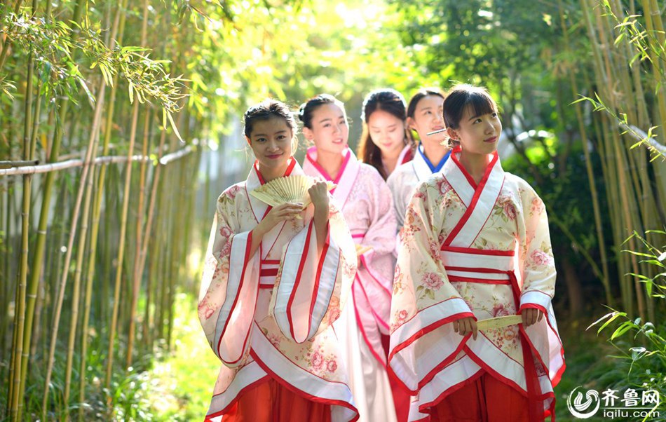 Charming dancing students pose for graduation photos