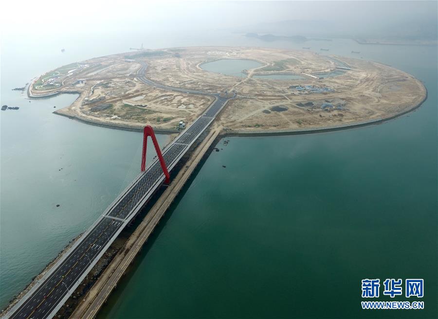 Bridge Connects China's First Artificial Offshore Island with Mainland