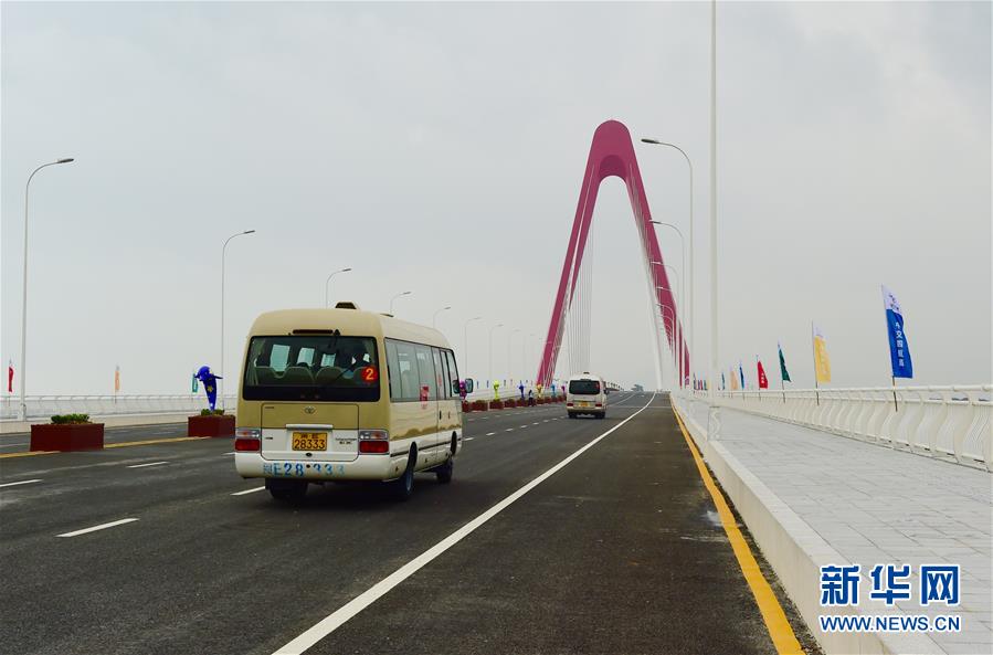 Bridge Connects China's First Artificial Offshore Island with Mainland