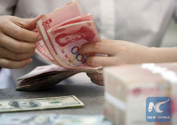 China won't devaluate yuan, long-term fall unlikely: PBOC