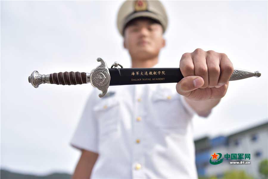 Swords conferred upon naval academy graduates