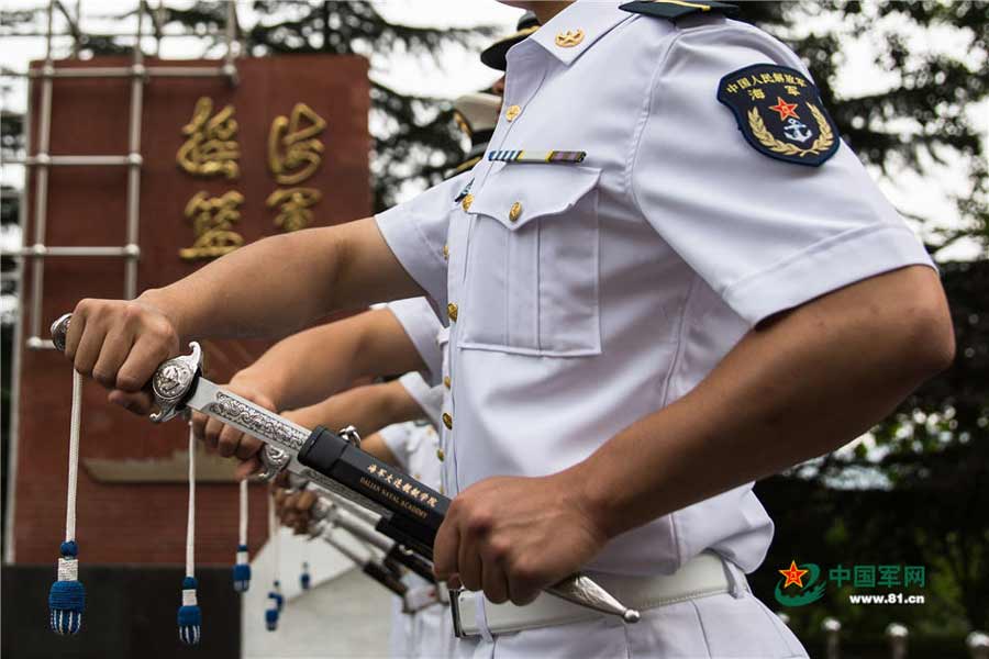 Swords conferred upon naval academy graduates