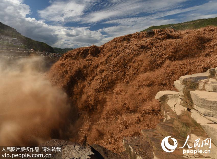 Spectacular Hukou Waterfall during summer flood season