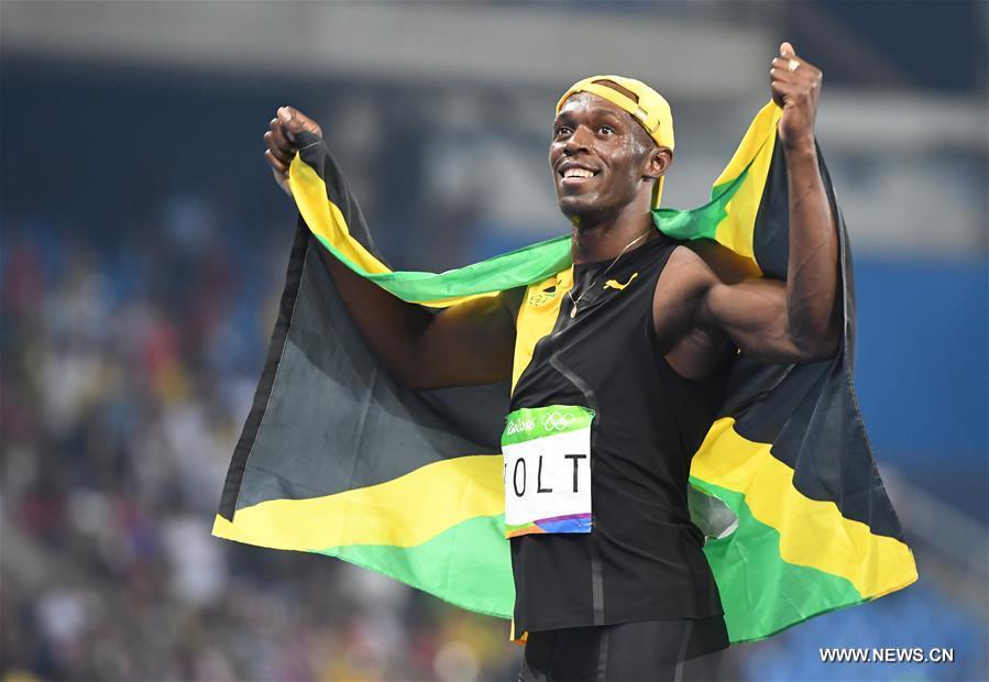 Bolt wins third Olympic men's 100m title