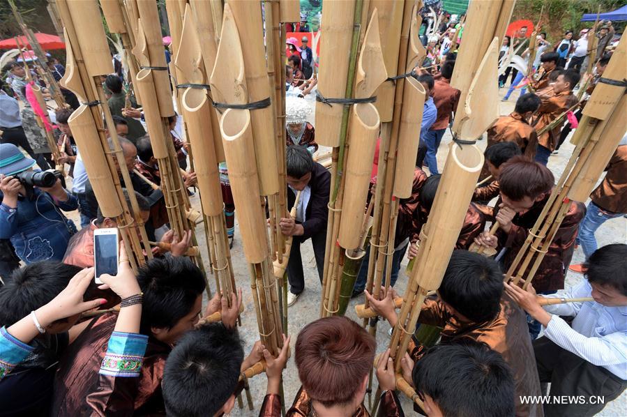 The festival, during which local people make sticky rice cakes, is held on Monday to celebrate the harvest and to pray for a good farming season.