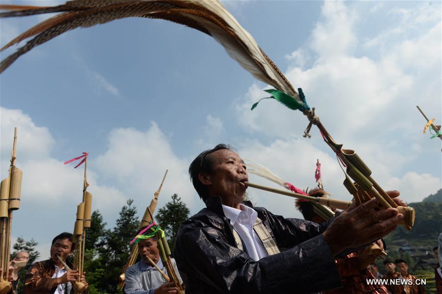 The festival, during which local people make sticky rice cakes, is held on Monday to celebrate the harvest and to pray for a good farming season.