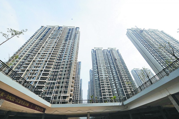 More Chinese cities to move to tame housing price rise: report