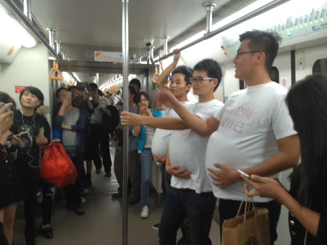 'Pregnant' men in Chengdu subway call for more freedom for pregnant women