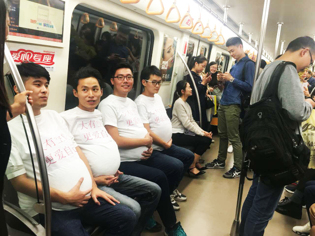 'Pregnant' men in Chengdu subway call for more freedom for pregnant women