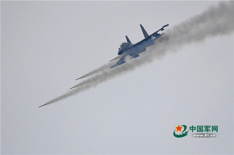 H-6K, Su-30 participate in military exercises