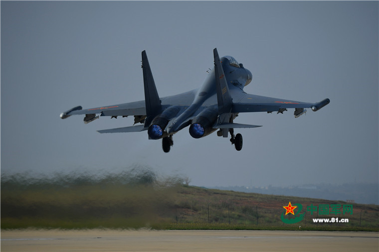 H-6K, Su-30 participate in military exercises