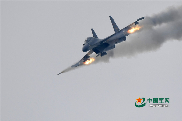 H-6K, Su-30 participate in military exercises