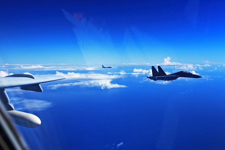 H-6K, Su-30 participate in military exercises