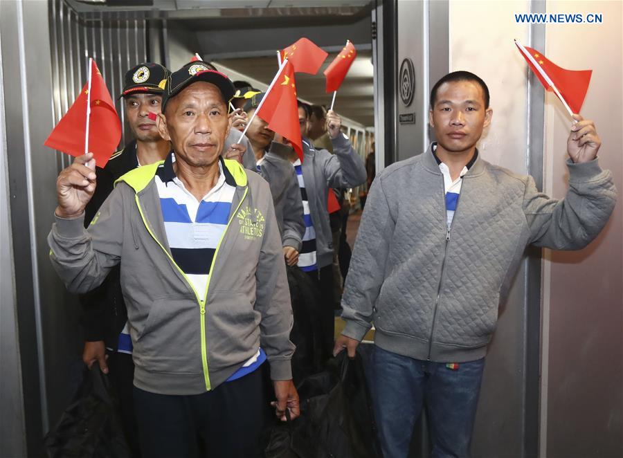 Rescued Chinese return home