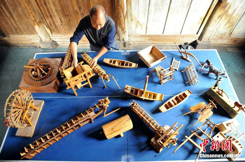 Carpenter crafts traditional farm tools in Jiangxi