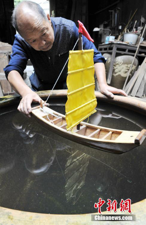 Carpenter crafts traditional farm tools in Jiangxi