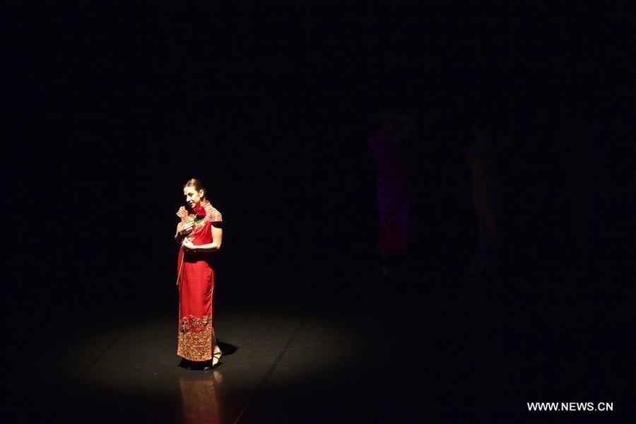 Performers dance during the dancing show 'Heaven, Earth, People' in Rome, Italy, Dec. 10, 2016. The show 'Heaven, Earth, People' is directed by Two Chinese students Zheng Lu and Jiang Churui, who graduated from Beijing Dancing Academy. 