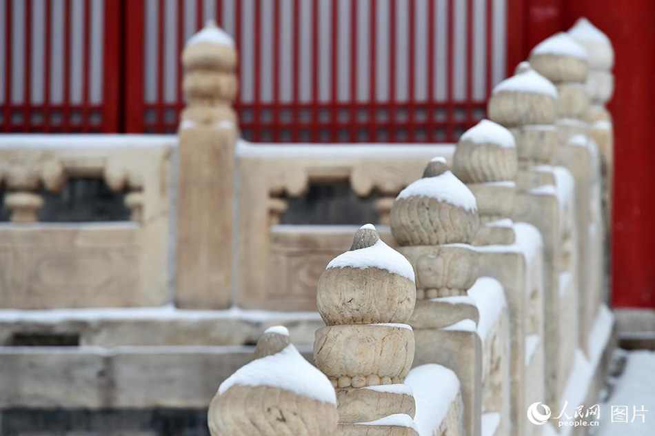 Enjoy the poetic beauty of Palace Museum coated in snow